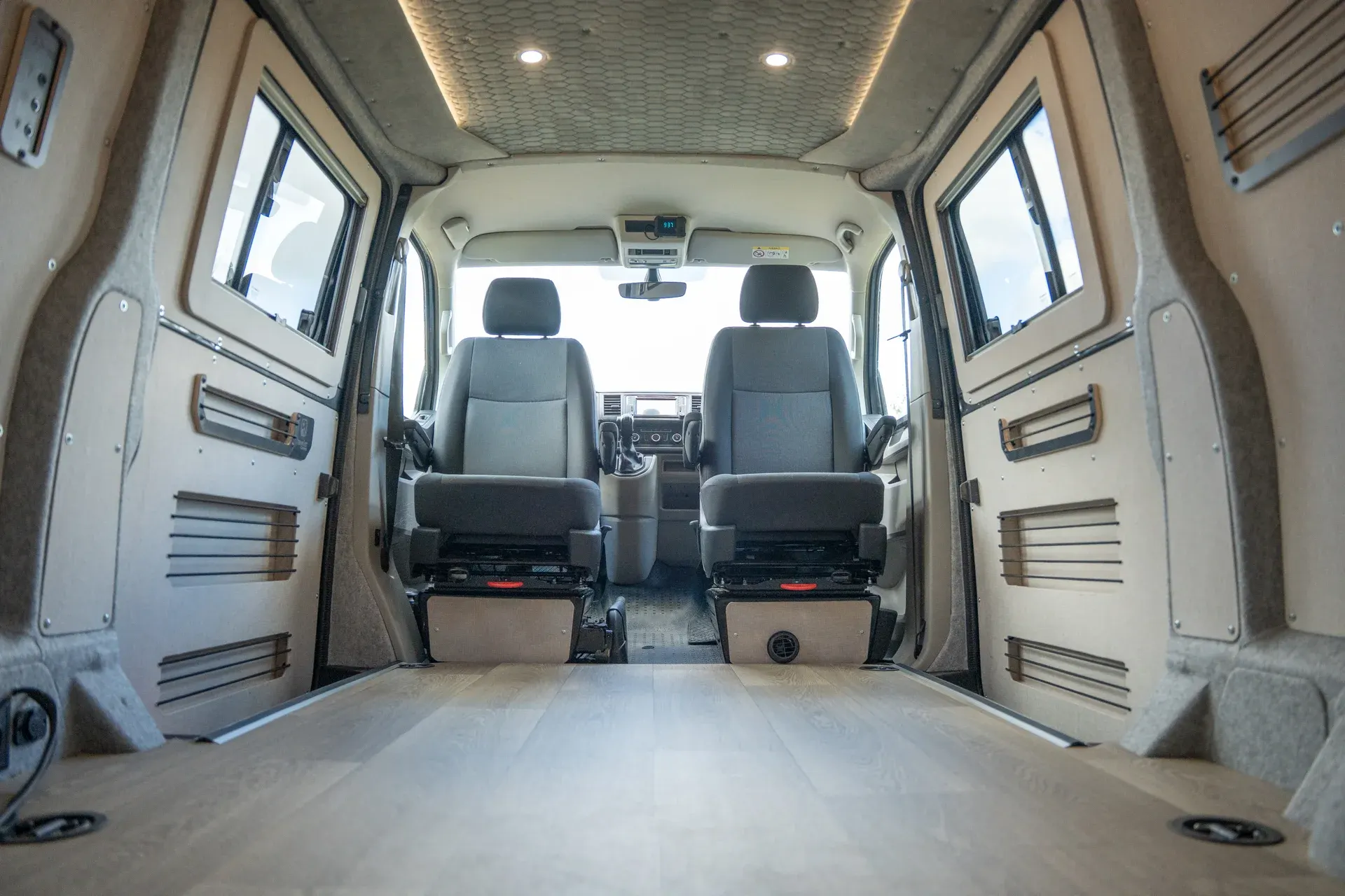 Two single front seats on swivel bases