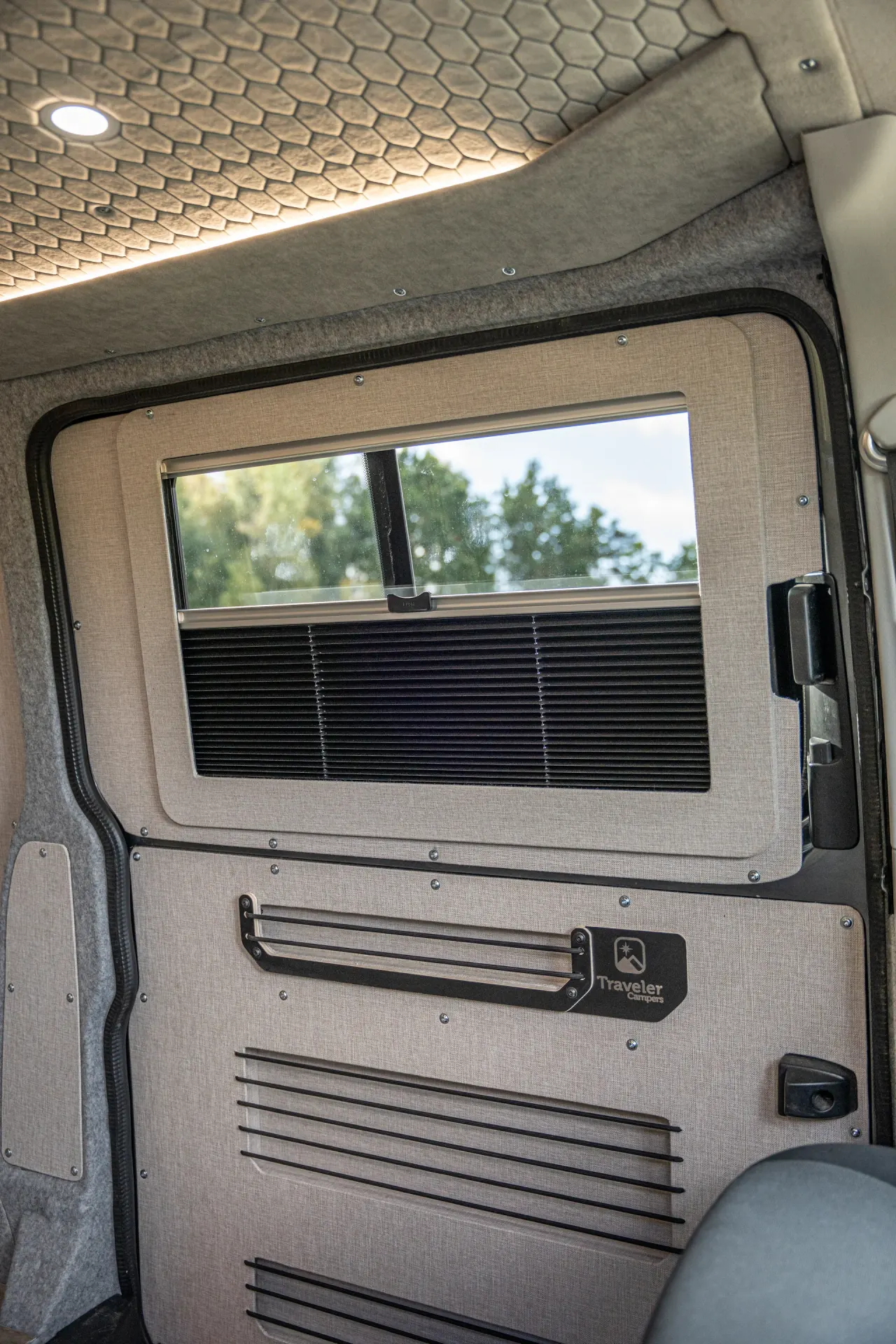 Window panel with partly closed blind