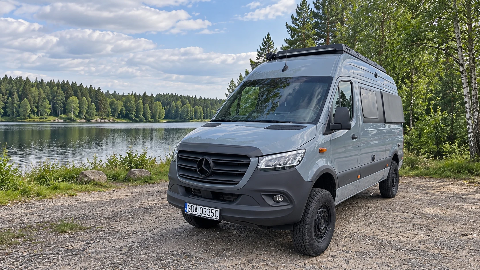 Mercedes Sprinter 4x4 beside a lake